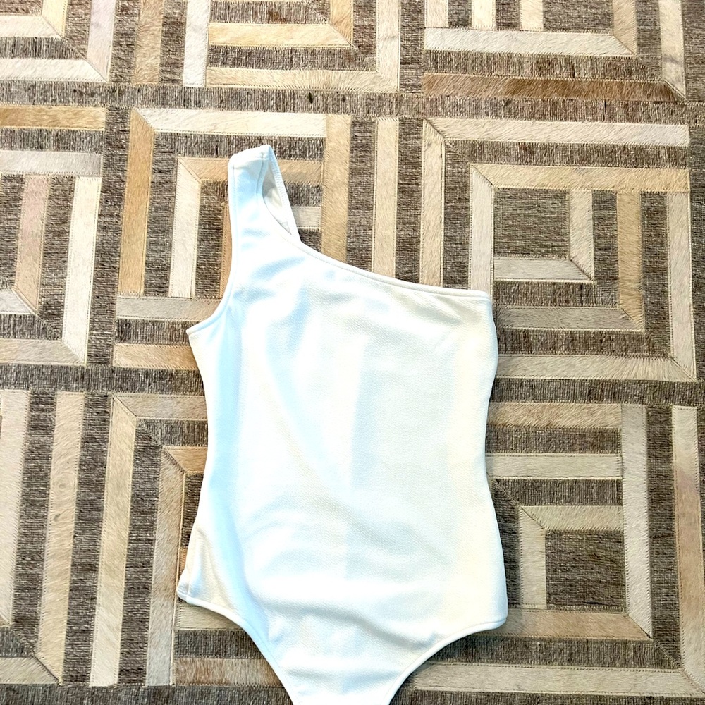 White, one shouldered bodysuit